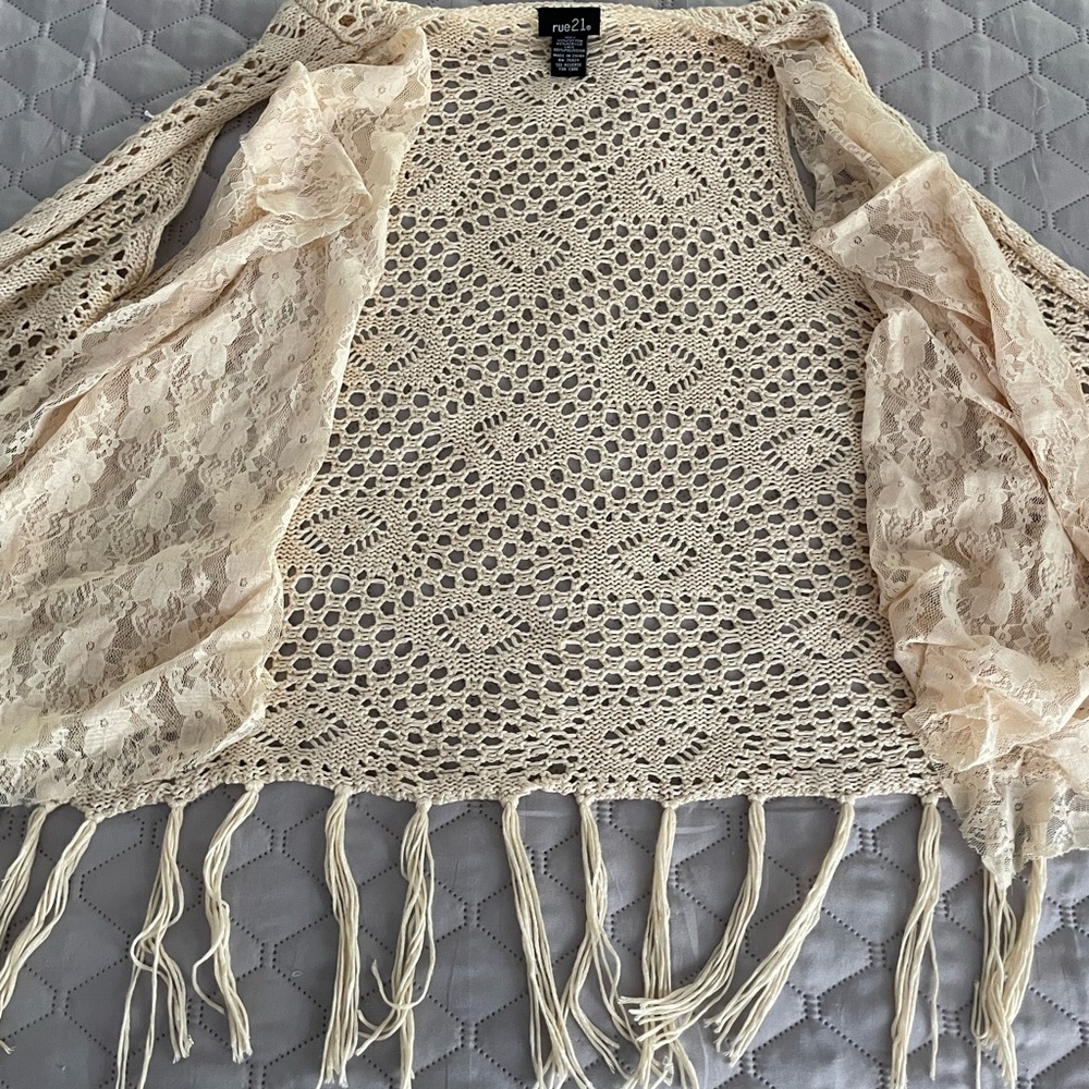 SOLDOpen weave boho style sweater vest. Cute lace layer with tassles.